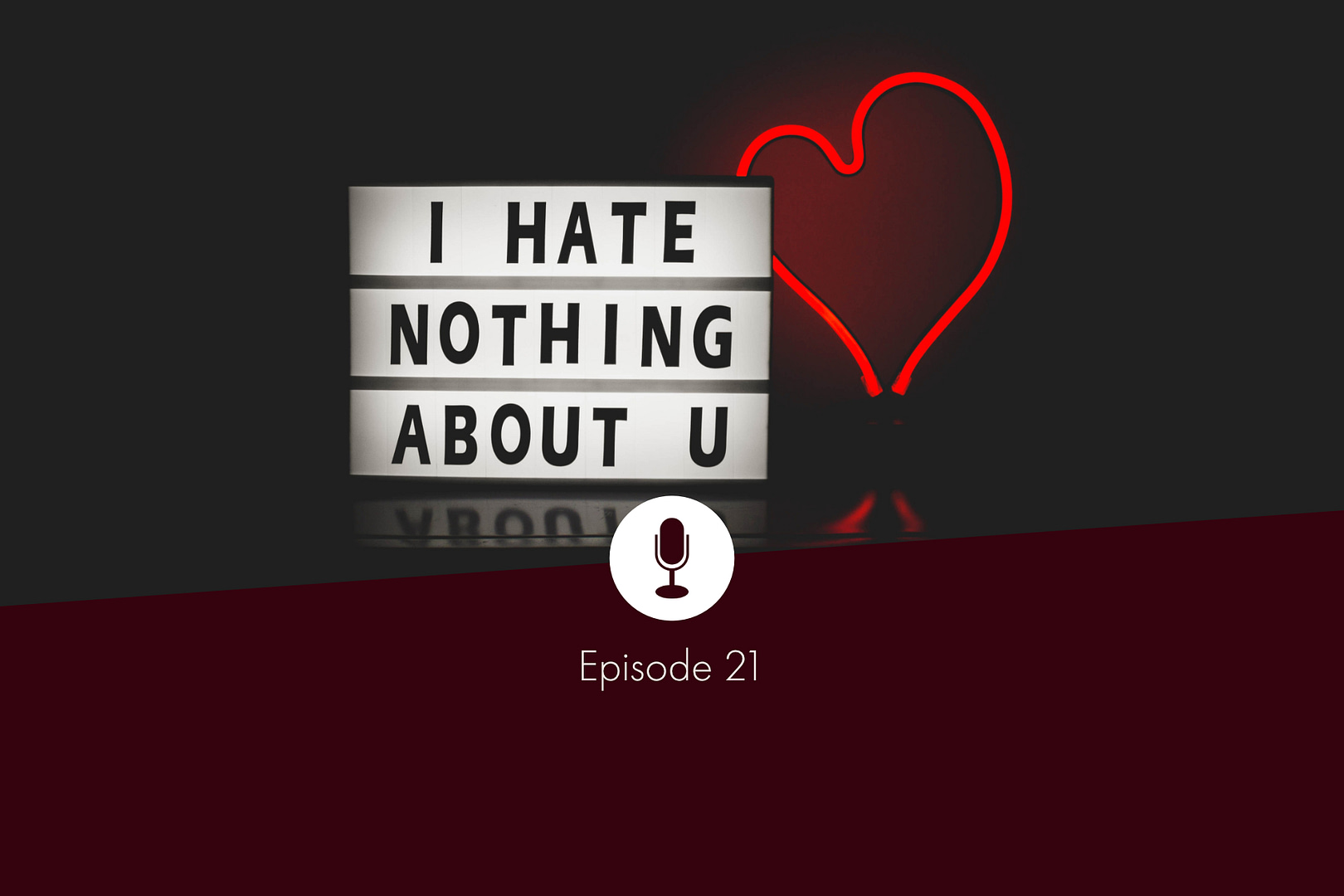 Illumninated text "I hate nothing about U" and a red, heart-shaped fluorescent tube