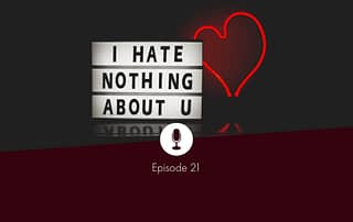 Illumninated text "I hate nothing about U" and a red, heart-shaped fluorescent tube